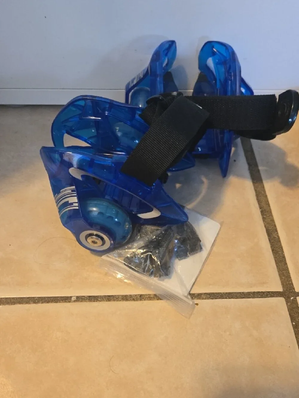 Razor Blue LED Heel Wheels with Black Straps